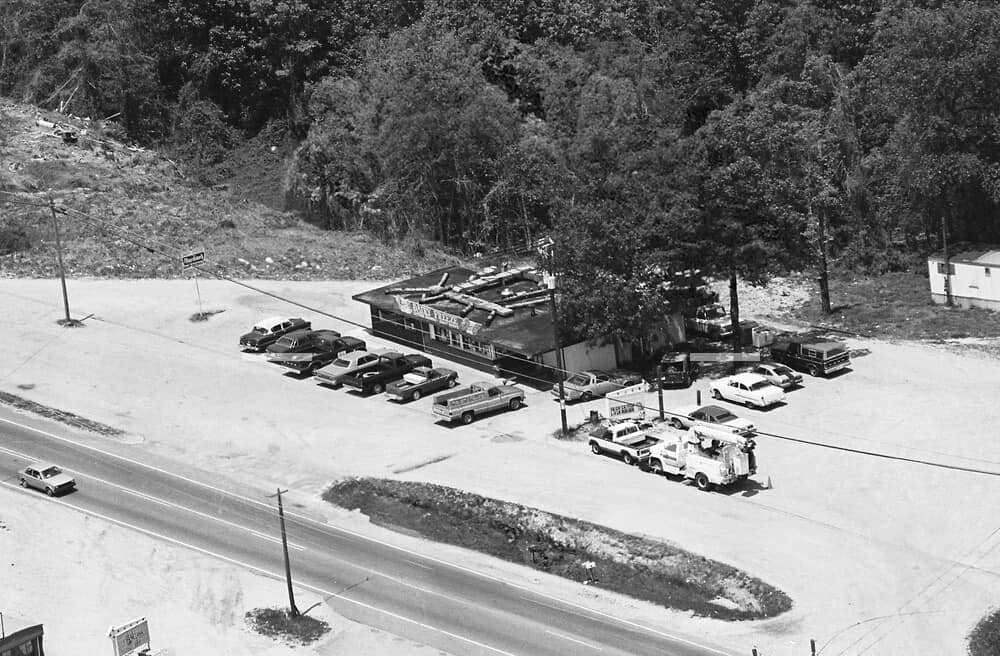 Aerial view of the restaurant and its large parking area