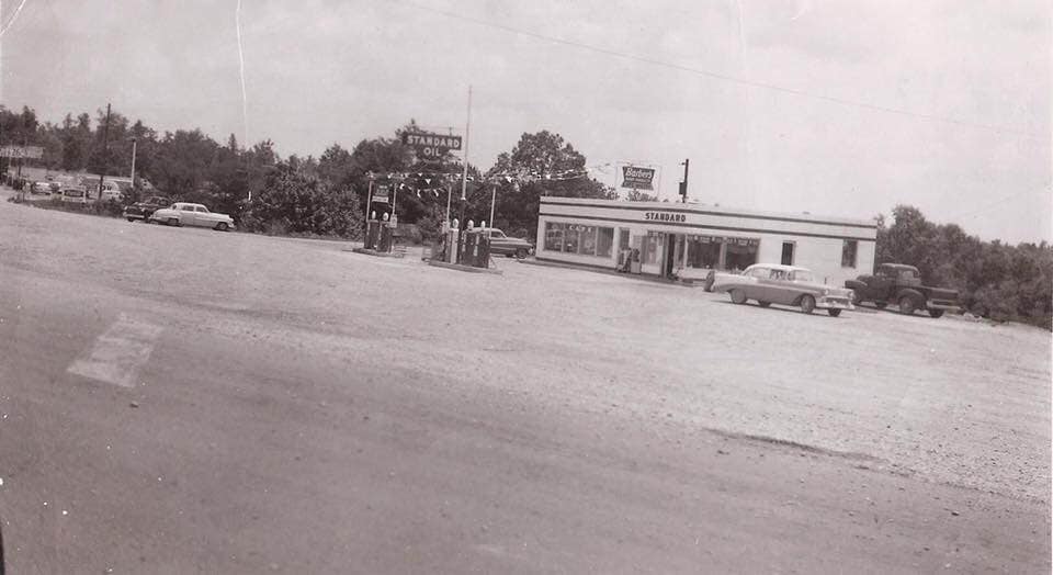 Historic Standard Oil station and roadside building in Weston